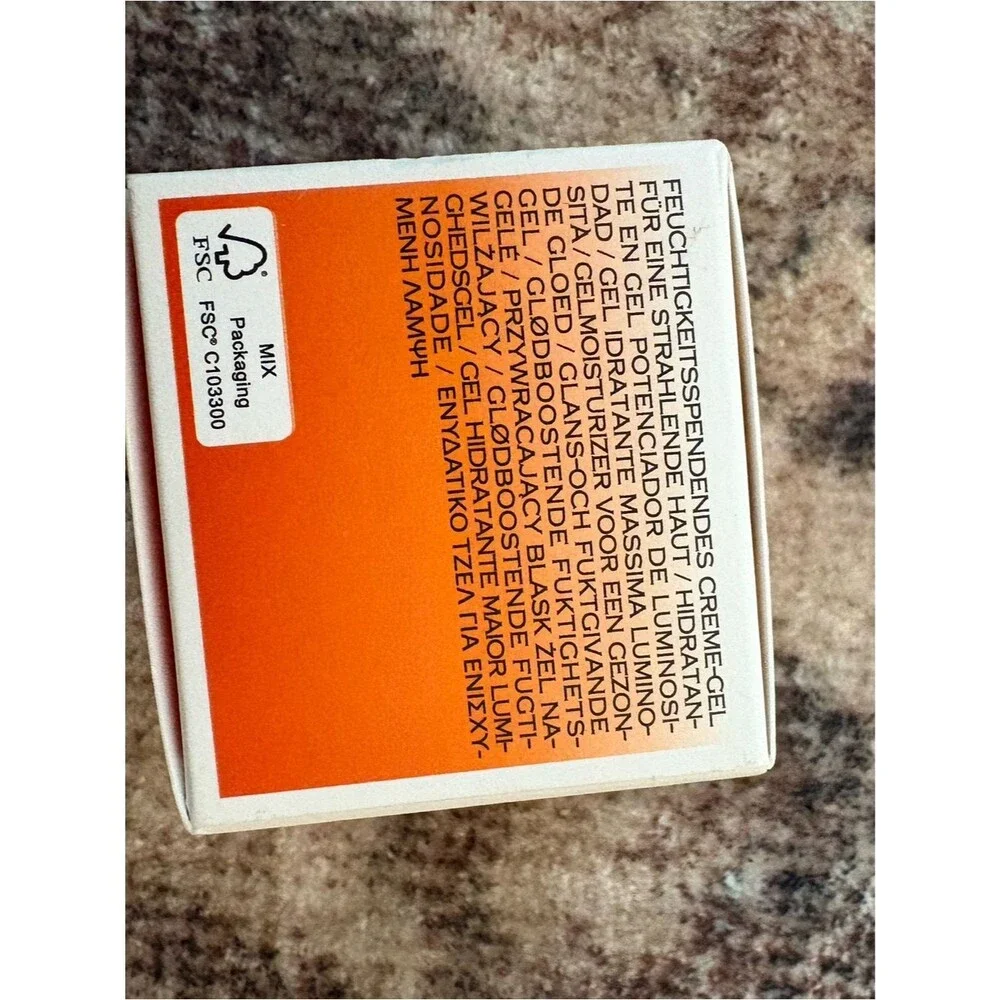 Origins GinZing Glow-Boosting Gel Moisturizer in White and Orange
